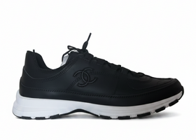 Sneakers Chanel noir blanc cuir